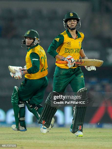 Mignon Du Preez captain of South Africa and Marizanne Kapp of South Africa run between the wickets during the ICC Women's World Twenty20 match...