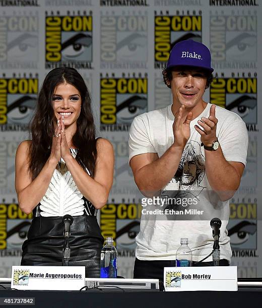 Actress Marie Avgeropoulos and actor Bob Morley attend a special video presentation and panel for "The 100" during Comic-Con International 2015 at...