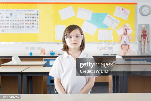 Girl (11-13) standing in school laboratory Girl (11-13) standing in school laboratory