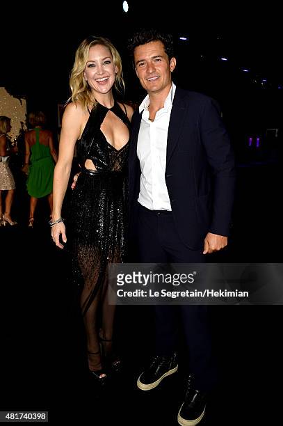 Kate Hudson and Orlando Bloom attend the Cocktail reception during The Leonardo DiCaprio Foundation 2nd Annual Saint-Tropez Gala at Domaine Bertaud...