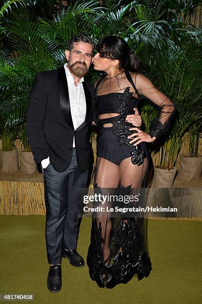 Salvo Nicosia and Michelle Rodriguez attend the Cocktail reception during The Leonardo DiCaprio Foundation 2nd Annual Saint-Tropez Gala at Domaine...