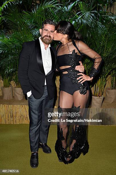 Salvo Nicosia and Michelle Rodriguez attend the Cocktail reception during The Leonardo DiCaprio Foundation 2nd Annual Saint-Tropez Gala at Domaine...