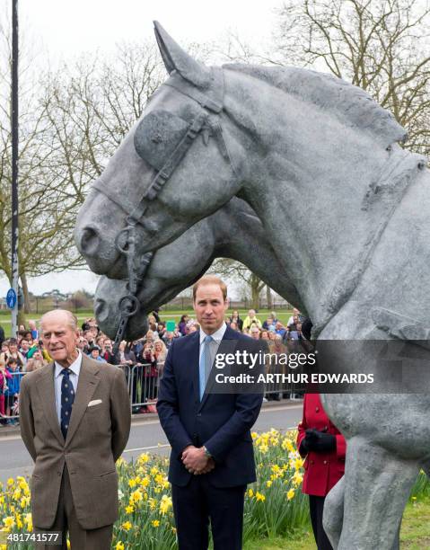 Britain's Prince Philip, Duke of Edinburgh and Britain's Prince William, Duke of Cambridge accompany Britain's Queen Elizabeth II as she officially...