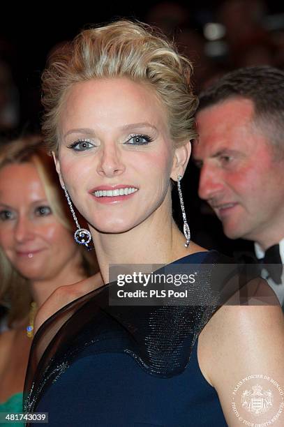 Princess Charlene of Monaco attends the Rose Ball 2014 in aid of the Princess Grace Foundation at Sporting Monte-Carlo on March 29, 2014 in...