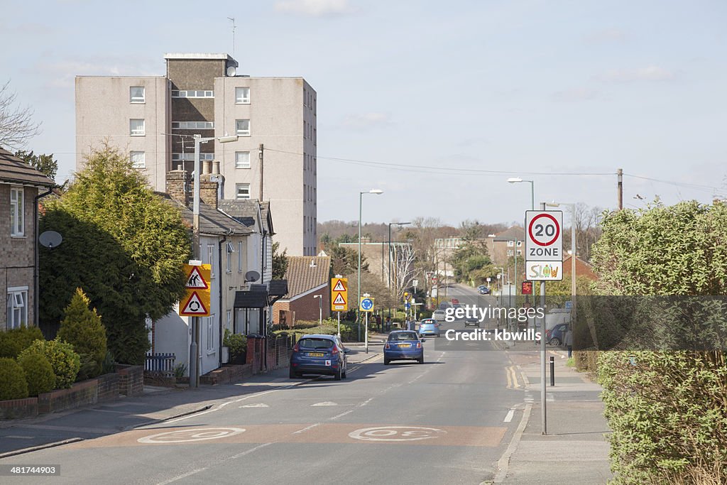 Light traffic suburban streetscene in the town of Harlow England