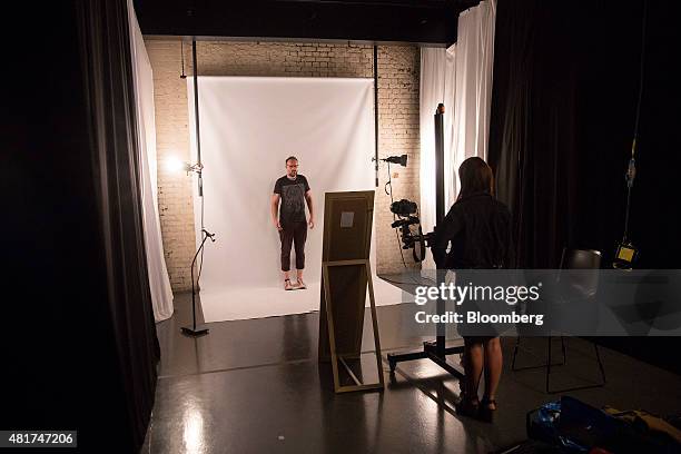 Employees make preparations for a launch party at Amazon.com Inc.'s new fashion photography studio in the Shoreditch district of London, U.K., on...