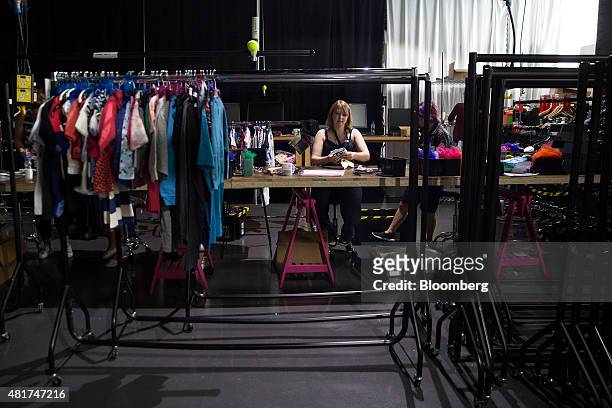 Employees make preparations for a launch party at Amazon.com Inc.'s new fashion photography studio in the Shoreditch district of London, U.K., on...