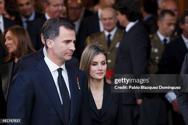 Prince Felipe of Spain and Princess Letizia of Spain leave from the state funeral for former Spanish prime minister Adolfo Suarez at the Almudena...