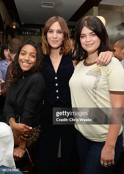 English music recording artist Remy Nicole, Alexa Chung and Pixie Geldof attend a dinner celebrating the launch of Alexa Chung X AG PA at Petit Trois...