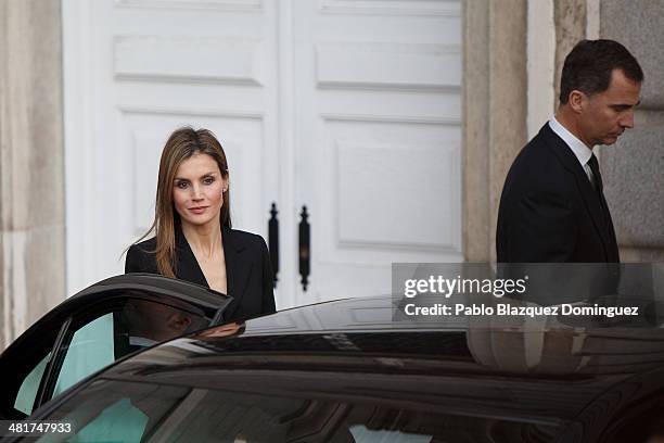 Princess Letizia of Spain and Prince Felipe of Spain leave from the state funeral for former Spanish prime minister Adolfo Suarez at the Almudena...