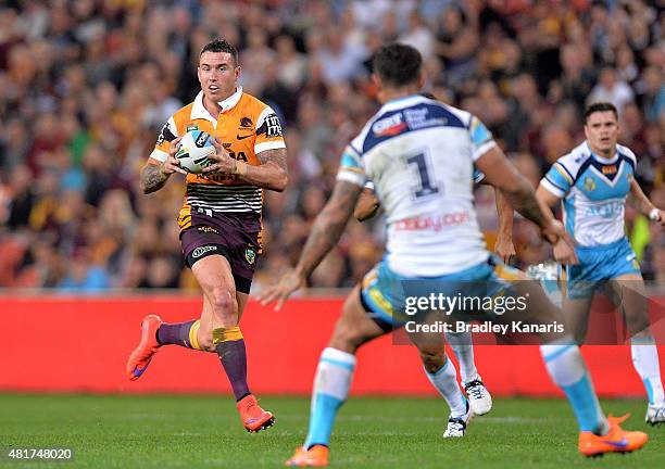 Darius Boyd of the Broncos breaks away from the defence during the round 20 NRL match between the Brisbane Broncos and the Gold Coast Titans at...