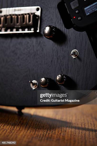 Detail of the control knobs on an Ibanez RGKP6 electric guitar, taken on December 8, 2014.