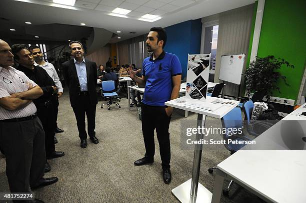 An aspiring Iranian high-tech entrepreneur presents his real estate app idea at Avatech, a technology incubator company and startup accelerator in...