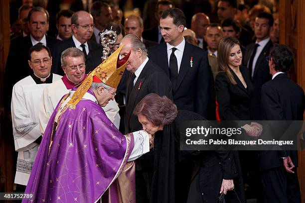Queen Sofia of Spain kisses the hand of Archbishop of Madrid Rouco Varela after the state funeral ceremony for former Spanish prime minister Adolfo...