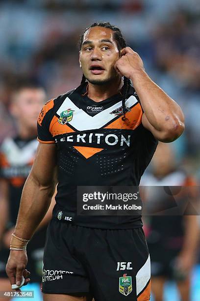 Martin Taupau of the Wests Tigers leaves the field after being given ten minutes in the sin bin during the round 20 NRL match between the Wests...