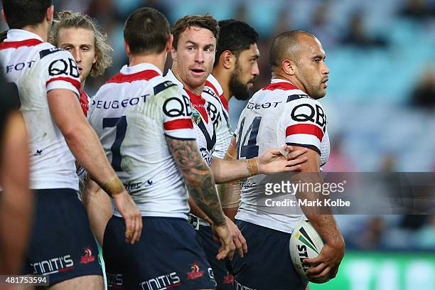 Sam Moa of the Roosters celebrates with his team mates after scoring a try during the round 20 NRL match between the Wests Tigers and the Sydney...