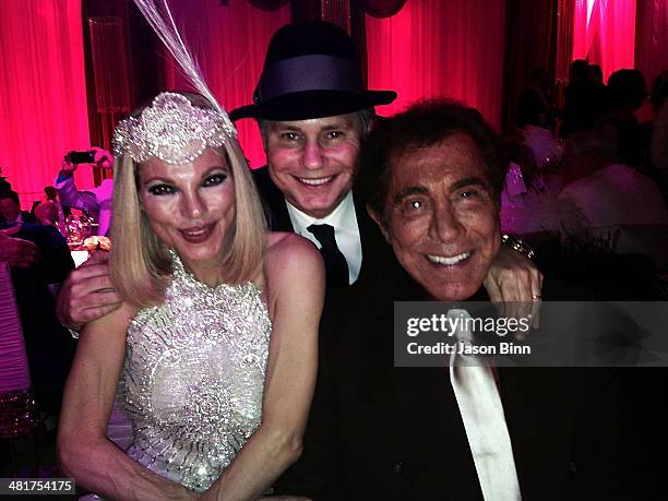 Andrea Hissom Wynn, DuJour Media Founder, Jason Binn and Steve Wynn pose circa March 2014 in Las Vegas, Nevada.