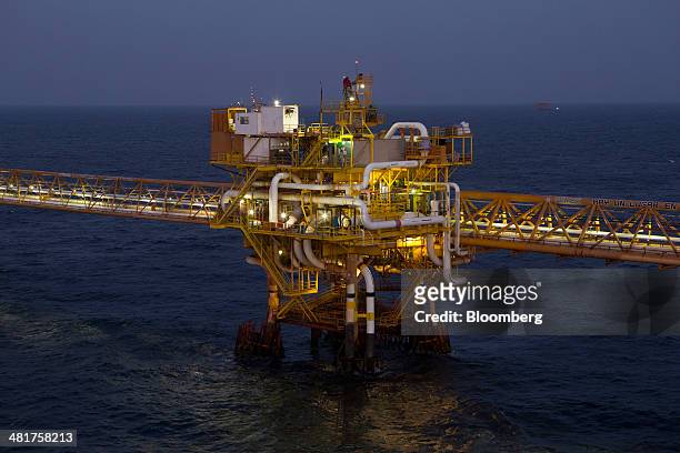 Lights illuminate a link platform, part of the Petroleos Mexicanos Pol-A Platform complex, located on the continental shelf in the Gulf of Mexico, 70...