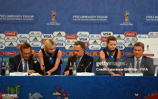 Secretary-General Jerome Valcke and Vitaly Mutko Chairman of the Local Organising Committee an sign a stamp during a press conference ahead of the...