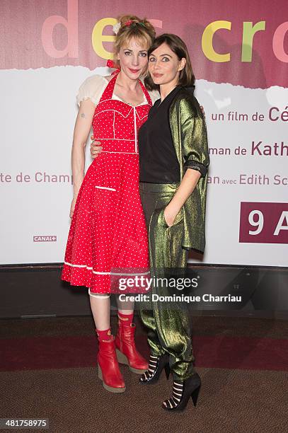 Julie Depardieu and Emmanuelle Beart attend the 'Les Yeux Jaunes Des Crocodiles' Paris Premiere at Cinema Gaumont Marignan on March 31, 2014 in...