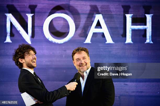 Host Alex Zane speaks with actor Russell Crowe as he attends the UK Premiere of "Noah" at the Odeon Leicester Square on March 31, 2014 in London,...