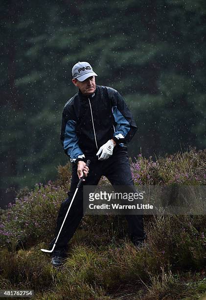 Jeff Maggert of the USA plays out of the heather by the 12th green during the second round of The Senior Open Championship on the Old Course at...