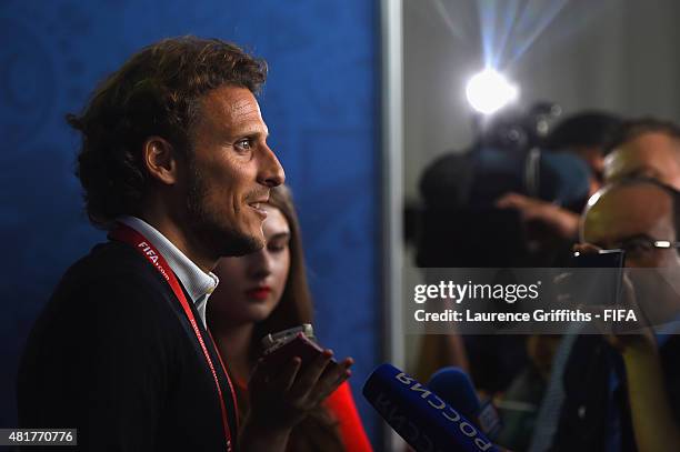 Draw assistant Diego Forlan speaks to the media ahead of the preliminary draw of the 2018 FIFA World Cup in Russia at Konstantin Palace on July 24,...