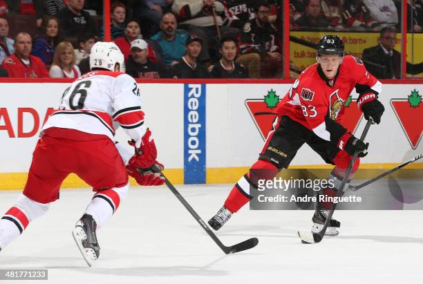 Ales Hemsky of the Ottawa Senators stickhandles the puck against John-Michael Liles of the Carolina Hurricanes at Canadian Tire Centre on March 31,...