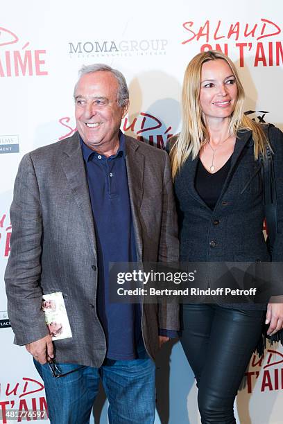 Daniel Hechter and his companion Dladlena attend the premiere of French director Claude Lelouch's film "Salaud, on t'aime" at Cinema UGC Normandie on...