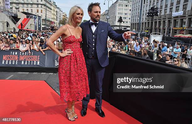 Jenni Falconer and Steven Gaetjen pose at the world premiere for the film 'Mission Impossible - Rogue Nation' at Staatsoper on July 23, 2015 in...