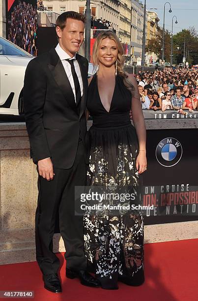 David Ellison and his wife Sandra Lynn Modic pose at the world premiere for the film 'Mission Impossible - Rogue Nation' at Staatsoper on July 23,...