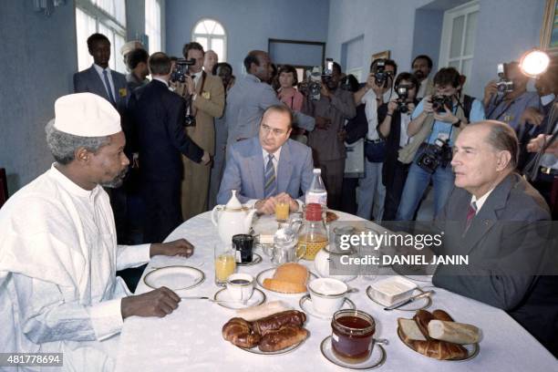 French president Francois Mitterrand and French Prime minister Jacques Chirac breakfast with Chadian President Hissene Habre during the 13th annual...