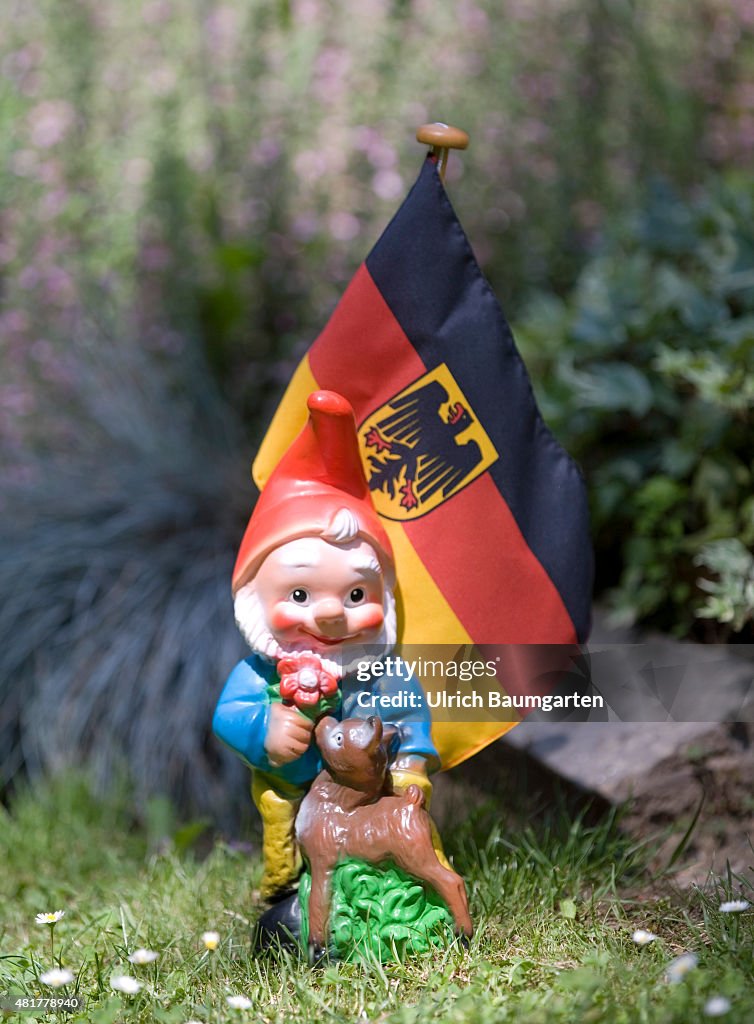 Garden gnome with a German flag.