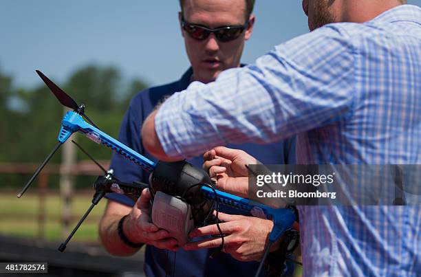 PrecisionHawk employees prepare for a live demonstration of a drone featuring LATAS in Durham, North Carolina, U.S., on Tuesday, July 7, 2015. Google...