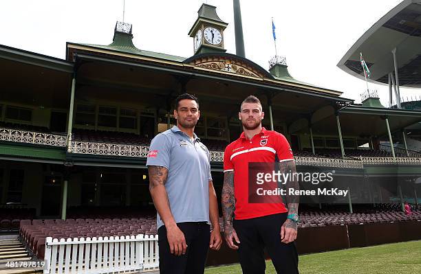 John Sutton of the Rabbitohs and Josh Dugan of the Dragons stand at the front of the Members stand during an NRL press conference at Sydney Cricket...