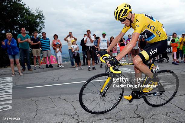 Chris Froome of Great Britain riding for Team Sky in the overall race leader yellow jersey makes the climb to the finish as he lost time to Nairo...
