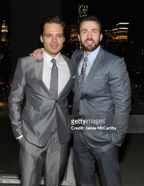 Actors Sebastian Stan and Chris Evans attend The Cinema Society & Gucci Guilty screening of Marvel's "Captain America: The Winter Soldier" after...