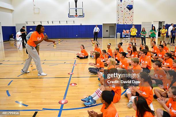 Tamika Catchings of the Indiana Fever speaks with young fans during a WNBA Fit All-Star Clinic presented by Kaiser Permanente at the Mohegan Tribe...