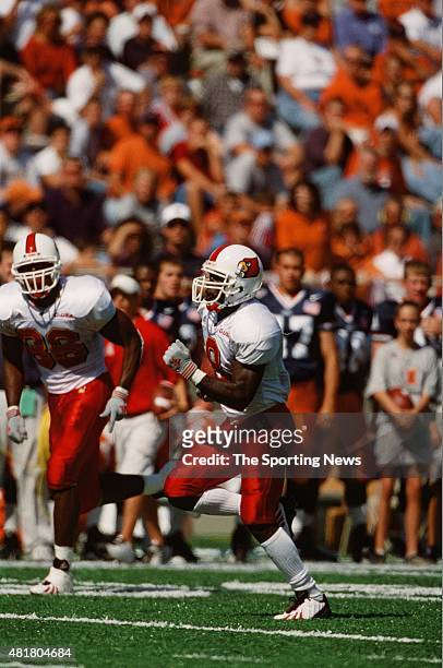 Deion Branch of the Louisville Cardinals runs with the ball against the Illinois Fighting Illini on September 22, 2001.