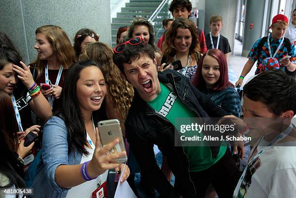 Toby Turner, stand-up comedian, actor, songwriter and YouTube personality, takes photos, signs autographs and interacts with fans at VidCon at the...