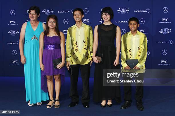 Datuk Marina Chin, principal of the Bukit Jalil Sports School with the Malaysian Sportsboys and Sportsgirls of 2012 and 2013 attend the 2014 Laureus...