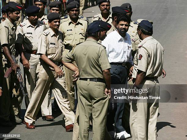 Prime suspect of the 1993 Mumbai bomb blasts case Yakub Abdul Razak Memon entering the Tada court on October 10, 2007 in Mumbai, India. Yakub Memon...