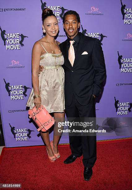 Actor Wesley Jonathan and Tamara Mitchell arrive at the Los Angeles premiere of "Make Your Move" at Pacific Theaters at the Grove on March 31, 2014...