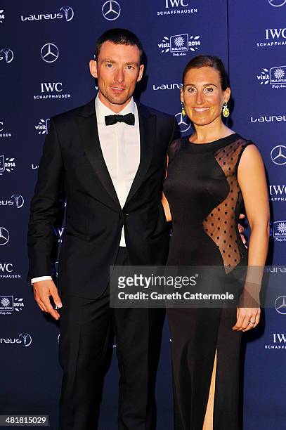 Mountain bike trials cyclist Kenny Belaey and guest attend the 2014 Laureus World Sports Awards at the Istana Budaya Theatre on March 26, 2014 in...