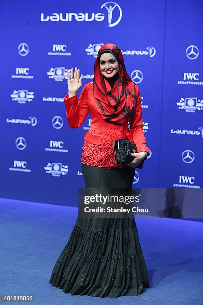 Singer Dato Siti Nurhaliza attends the 2014 Laureus World Sports Awards at the Istana Budaya Theatre on March 26, 2014 in Kuala Lumpur, Malaysia.