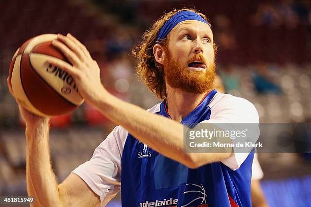 Luke Schenscher of the 36ers warms up before game three of the NBL Semi Final series between the Adelaide 36ers and the Melbourne Tigers at Adelaide...