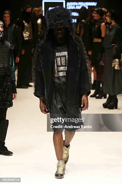 Model, wearing an outfit by the label La Folie, walks the runway at the AMD Akademie Mode & Design Best Graduate Show during Platform Fashion July...
