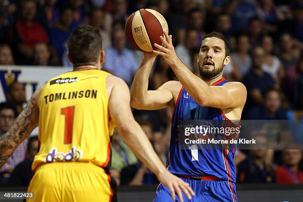 Adam Gibson of the 36ers passes the ball during game three of the NBL Semi Final series between the Adelaide 36ers and the Melbourne Tigers at...