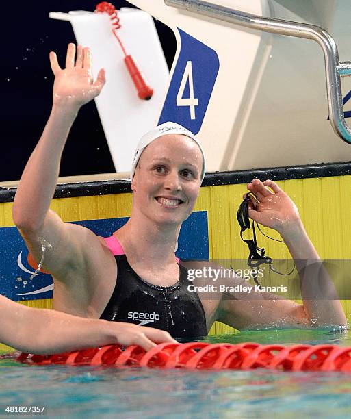 Bronte Barrett waves to fans after competing in the Womens 200 metre freestyle final during the 2014 Australian Swimming Championships at Brisbane...