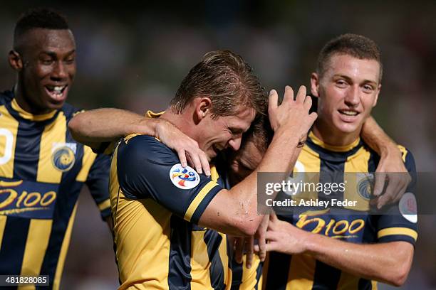 Mariners teammates Nick Fitzgerald Mitchell Duke Marcel Siep and Bernie Ibini celebrate a goal by Marcel Siep of the Mariners during the Asian...